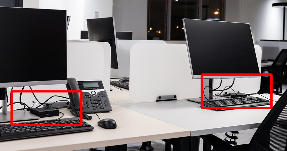 Typical hoteling desk with docking station